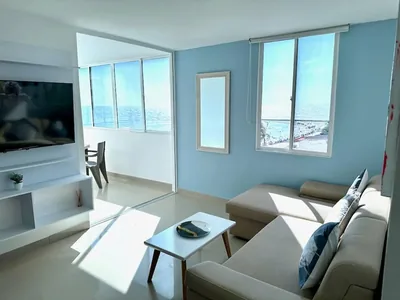 Sala y comedor junto a los ventanales del balcón cerrado — Tocahagua 708